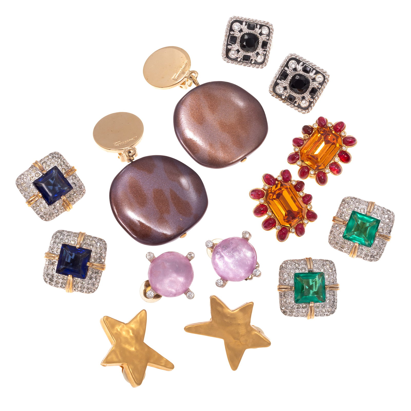 Collection of Seven Pairs of Signed, Costume Ear Clips: Collection of Seven Pairs of Signed, Costume Ear Clips Seven pairs of gold-tone or silver-tone non-pierced ear clips including: stylized gold-tone stars, Carlisle; two pairs featuring colorless