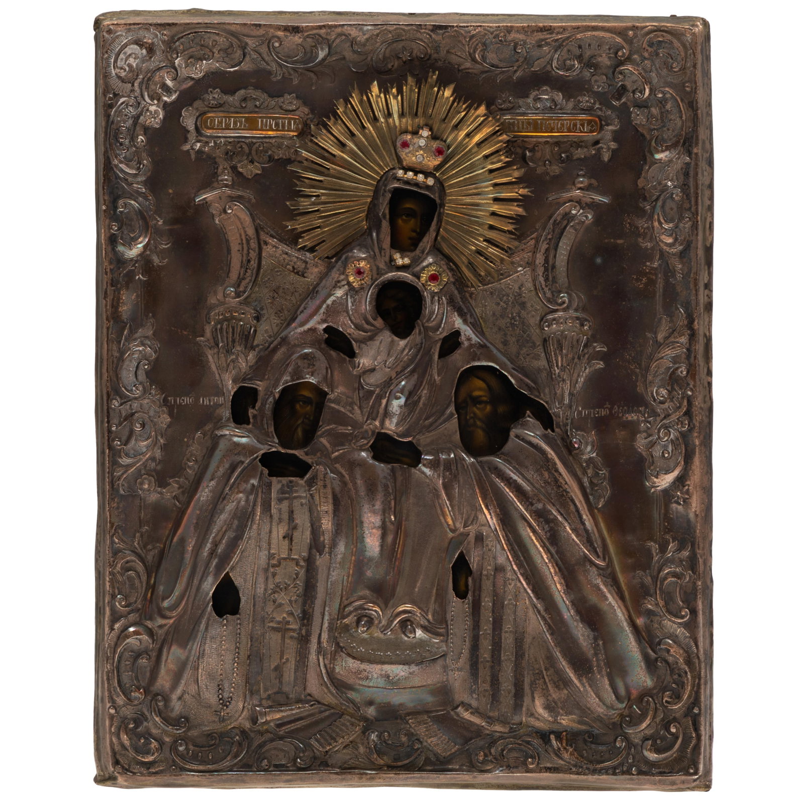 Russian Icon Mother of Smolensk: Russian Icon Mother of Smolensk The painted panel of the Virgin and Child with Saints beneath a silver and gilt oklad set with 'jewels'. 14in x 11in (36cm. x 28cm)