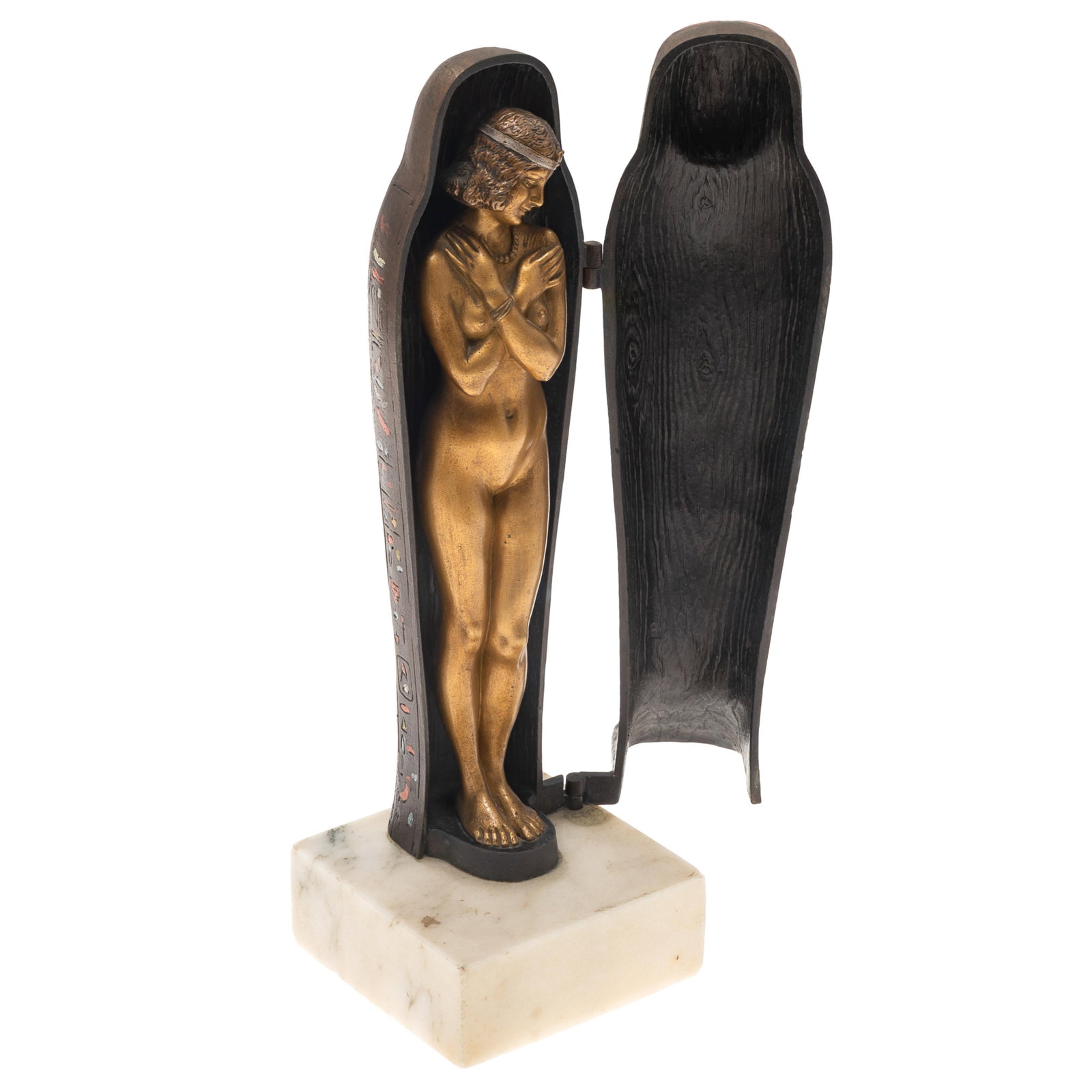 Franz Bergman (Austrian, 1861-1936), Bronze: Franz Bergman (Austrian, 1861-1936) Bronze The cold painted bronze figure of an Egyptian mummy, hinged opening to reveal a woman, nude but for a beaded necklace. Signed 'Namgreb' 9 1/2in (24cm) h.