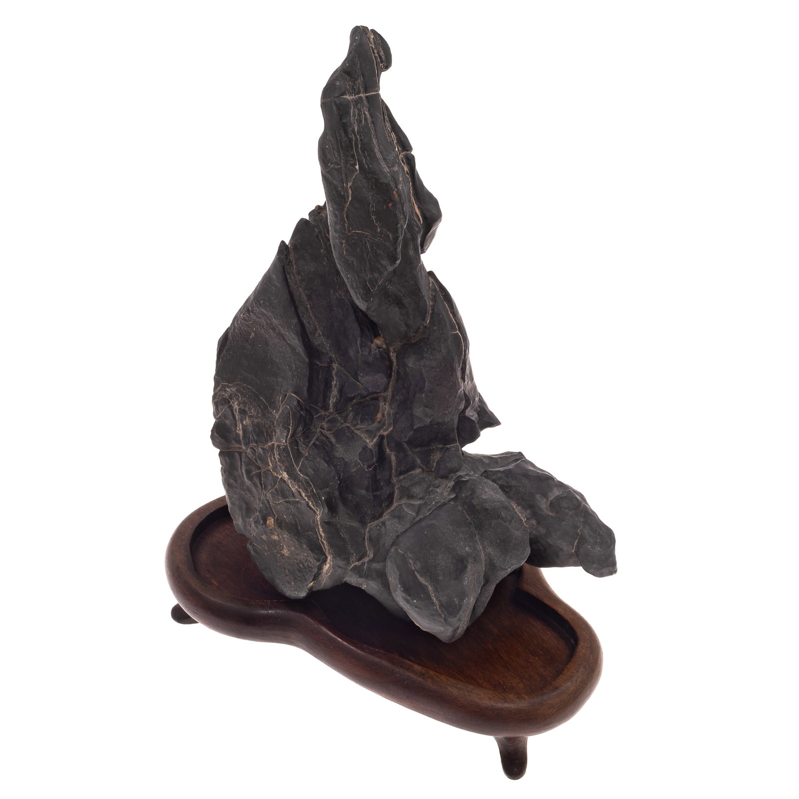 Chinese Scholar's Rock Linbi stone: Chinese Scholar's Rock Linbi stone A naturally formed Chinese scholar's rock of upright form with dark gray coloration and natural veining, mounted on a carved hardwood stand. Height: 10 inches. Condi