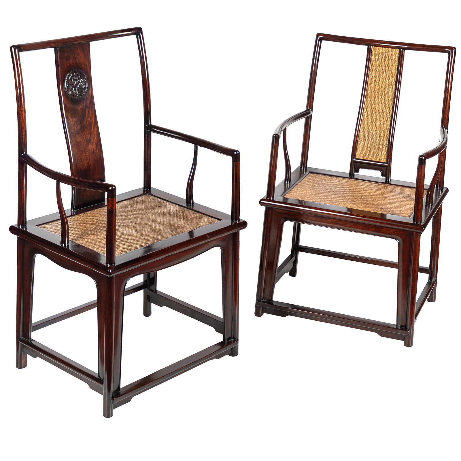Near Pair Chinese Hardwood Armchairs: Near Pair Chinese Hardwood Armchairs Mid 20th Century Each with a curved back and arms, one with a peony carved splat, over a woven seat andsquare legs joined by a box stretcher. The first; 40in (102c