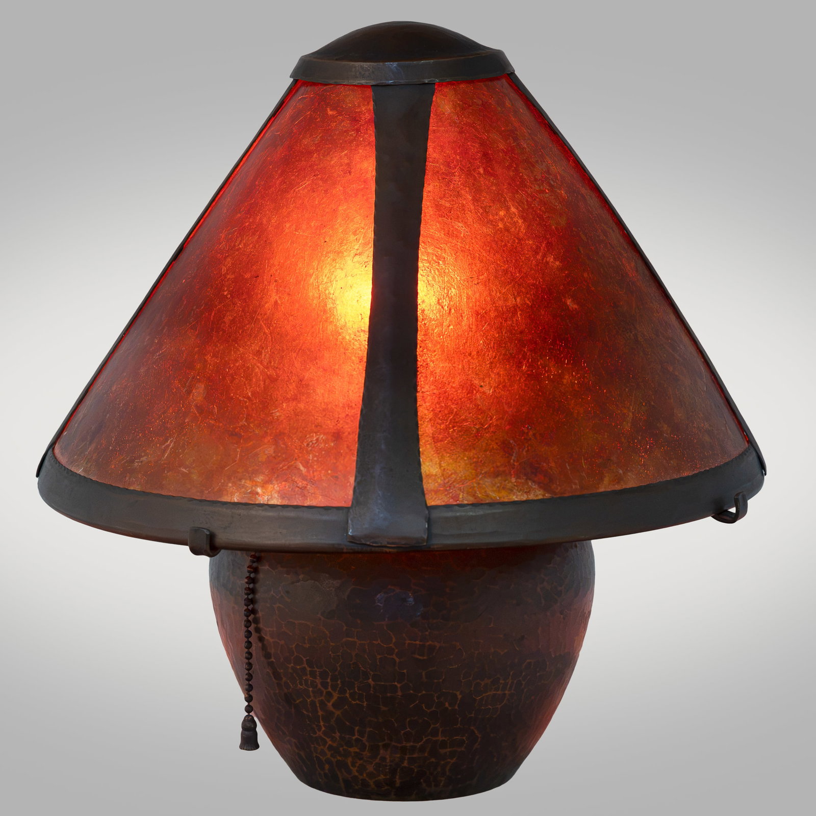 Arts & Crafts Hammered Copper Boudoir Lamp: Arts & Crafts Hammered Copper Boudoir Lamp Arts & Crafts hammered copper bean-pot form boudoir lamp having a drilled base, with mica shade. Unmarked. 11 1/2in. x 11in dia. (29cm. x 27cm) Condition:
