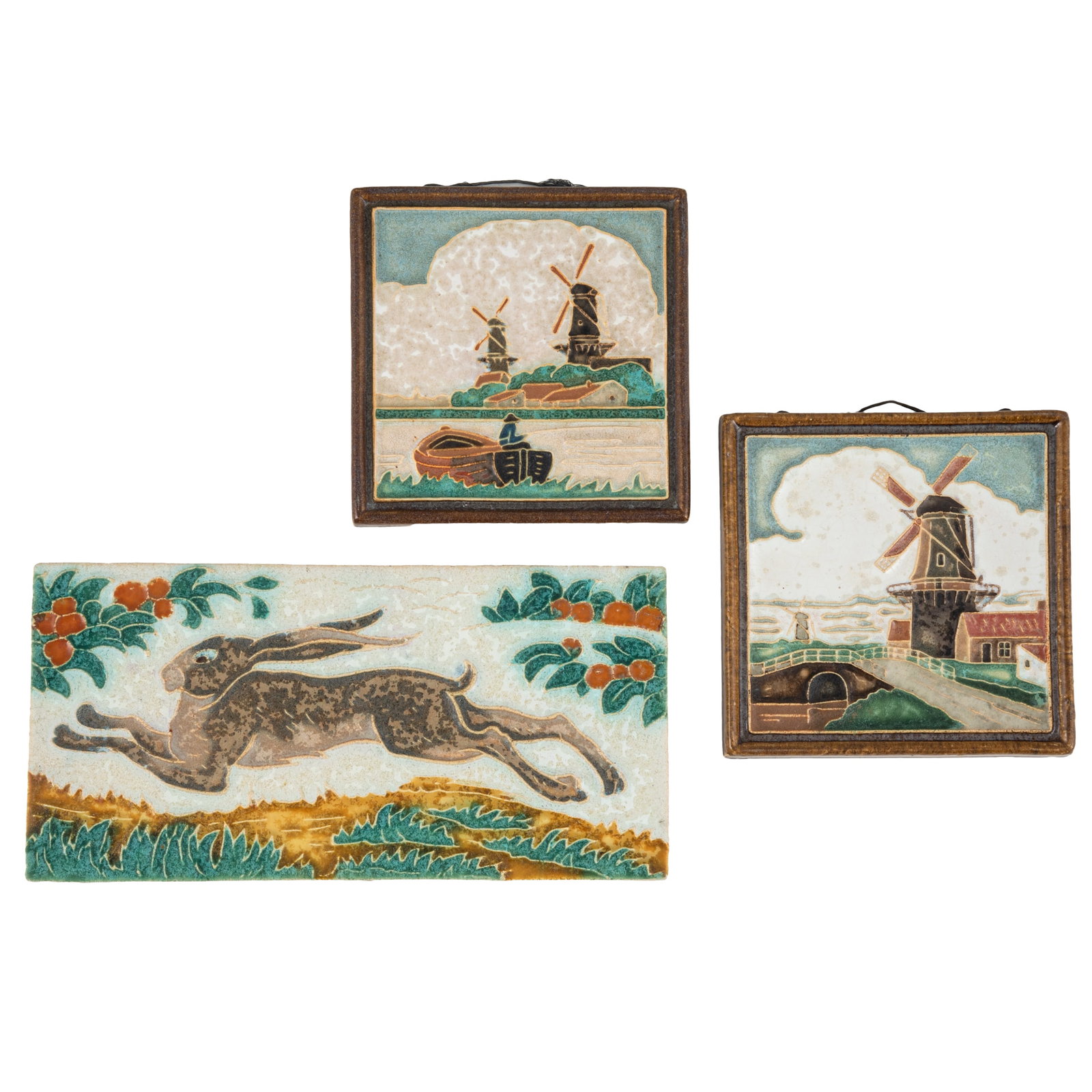 Delft Tiles, Rabbit, Windmills: Delft Tiles, Rabbit, Windmills Three Delft tiles, including two Dutch windmill tiles, and one leaping rabbit tile. Each impressed with Delft mark. Rabbit tile: 4 1/8in. x 8 1/4in (10 1/2cm. x 21cm) Wi