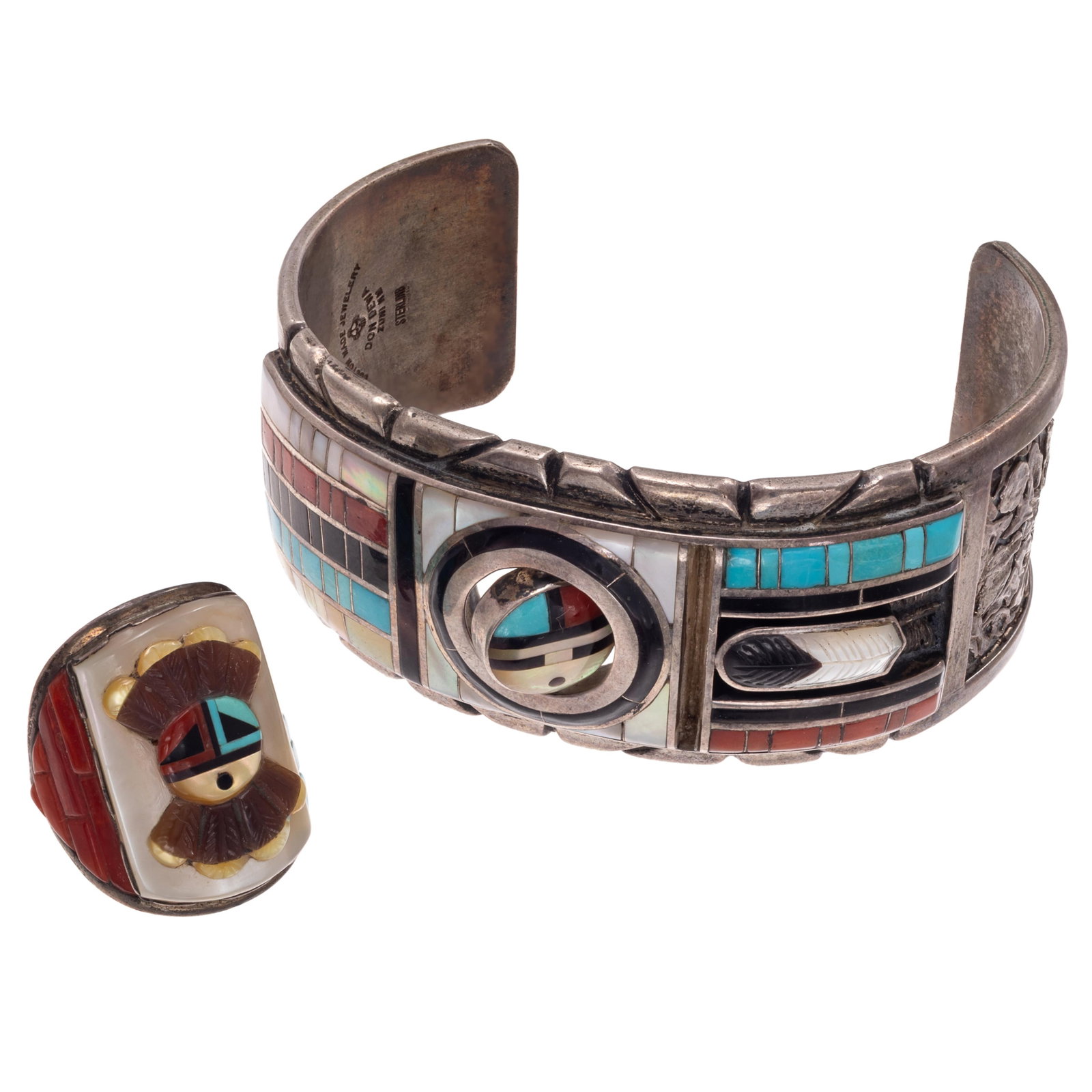 Zuni Multi-Stone Spinner Cuff Bracelet with Ring, Don Dewa: Zuni Multi-Stone Spinner Cuff Bracelet with Ring, Don Dewa Centering a spinning element designed as a Zuni mask, reversing to inlaid turquoise, jet and spiny oyster shell, framed by inlaid mother-of-p