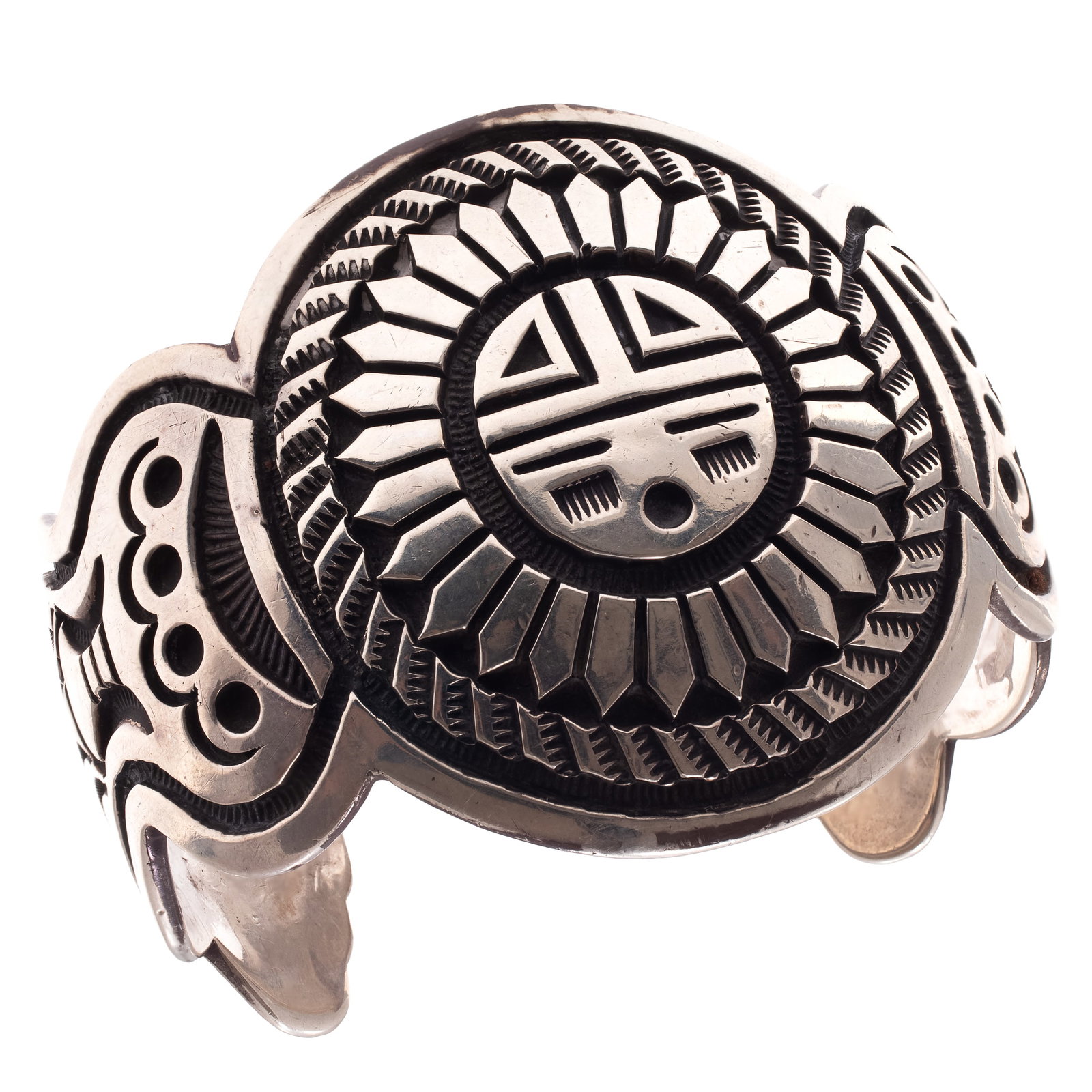 Silver Overlay Cuff Bracelet, Bill Emerson: Silver Overlay Cuff Bracelet, Bill Emerson Centering a Hopi sunface, set in a sterling silver overlay cuff bracelet measuring approximately 2.25 inches in width, inner circumference 7 1/4 inches, 1.28