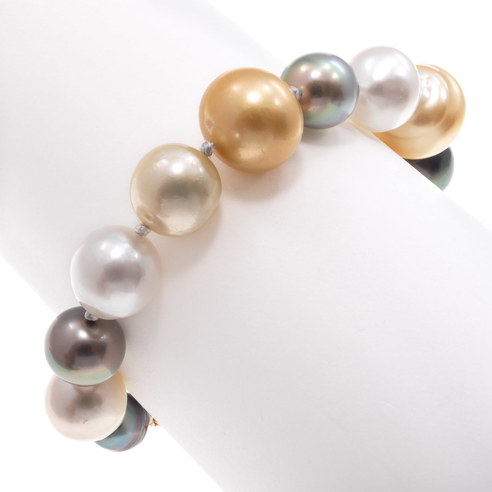 Multi-Color South Sea Cultured Pearl, Diamond, 18k Bracelet: Multi-Color South Sea Cultured Pearl, Diamond, 18k Bracelet Composed of thirteen baroque white, Tahitian gray, and golden South Sea cultured pearls measurin from approximately 14.0 mm to 9.6 mm, compl