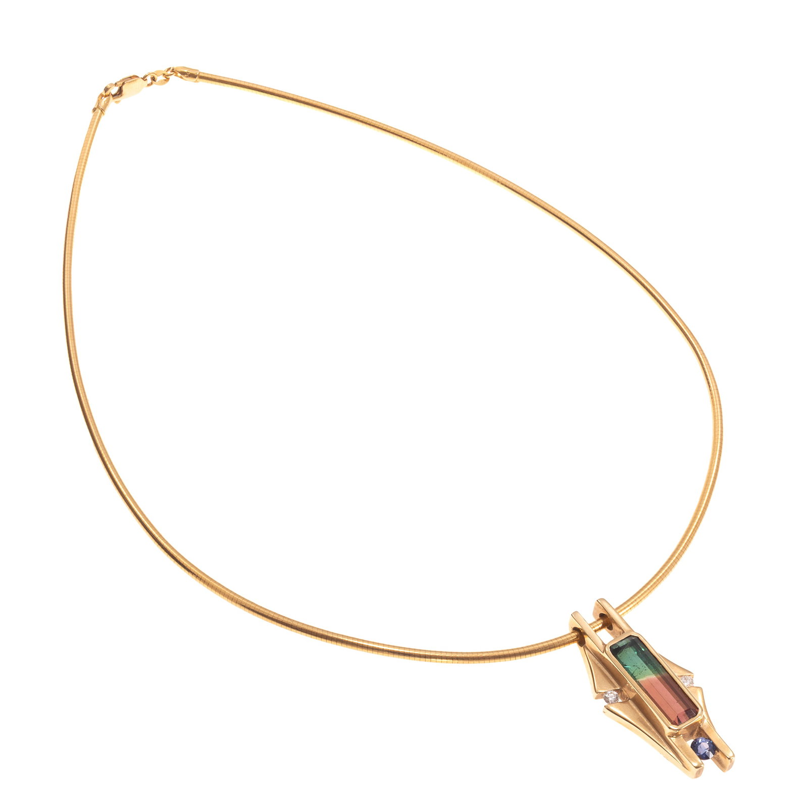 Tourmaline, Tanzanite, Diamond, 14k Yellow Gold Necklace: Tourmaline, Tanzanite, Diamond, 14k Yellow Gold Necklace Centering one rectangular step-cut bi-colored tourmaline weighing approximately 3.65 cts., accented by one round-cut tanzanite weighing approxi