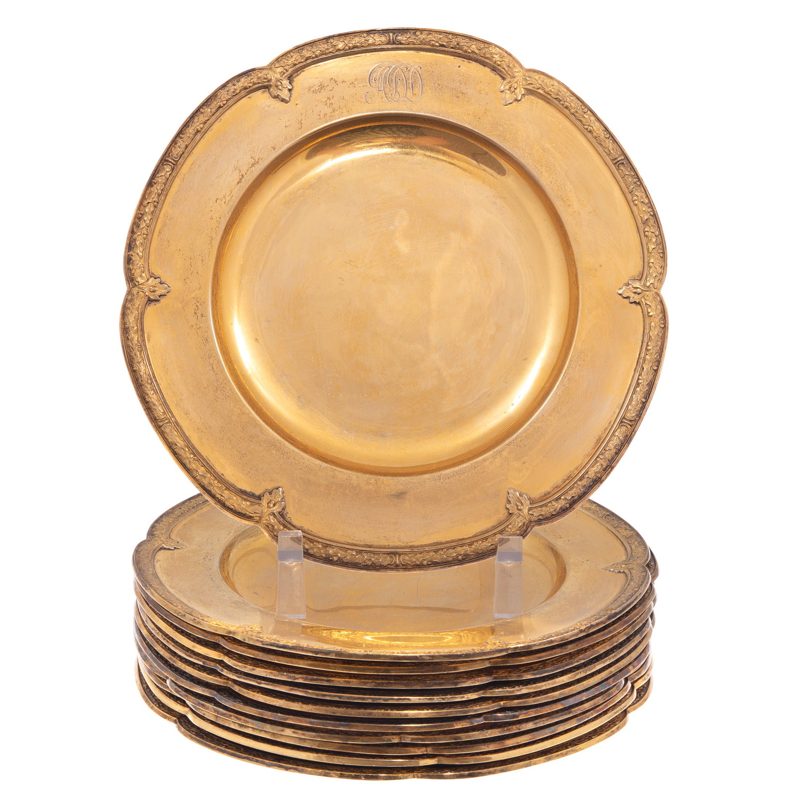 Edwardian Sterling Gilt Plates: Edwardian Sterling Gilt Plates A set of eleven, Royal Oak pattern Each with a scalloped rim repousse banded with oak leaf and acorn scrolling boughs. Monogrammed ATD 8in (20cm) Marked for Charles
