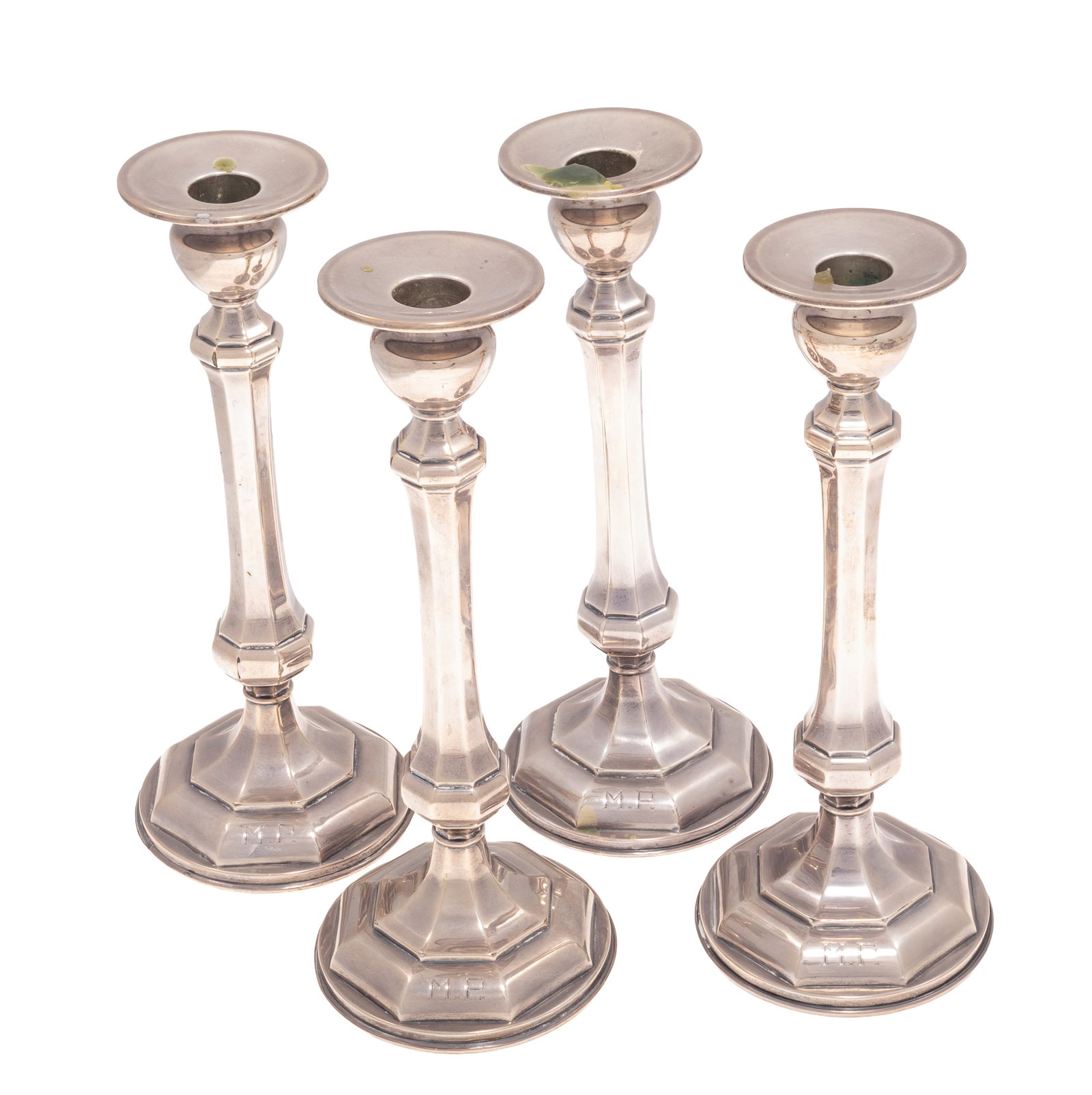 Four Dominick & Haff Sterling Candlesticks: Four Dominick & Haff Sterling Candlesticks Of Neoclassical style with tapering stem on stepped circular base. 10in (26cm) Weighted Monogrammed