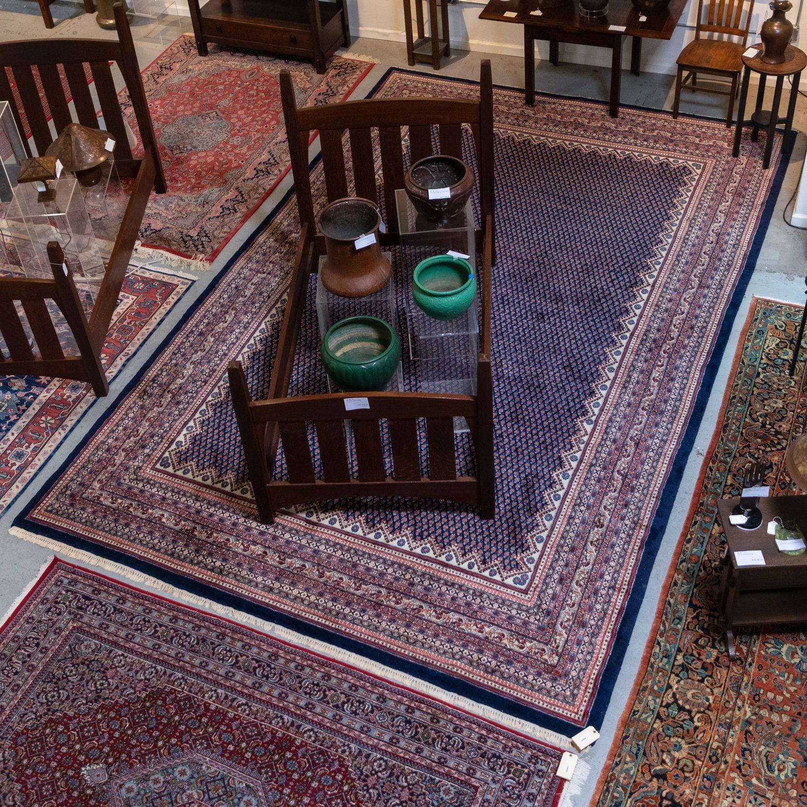 Persian Arrak rug: Persian Arrak rug The blue field of lattice work and roses within floral banding. Approximately 11ft x 16ft.