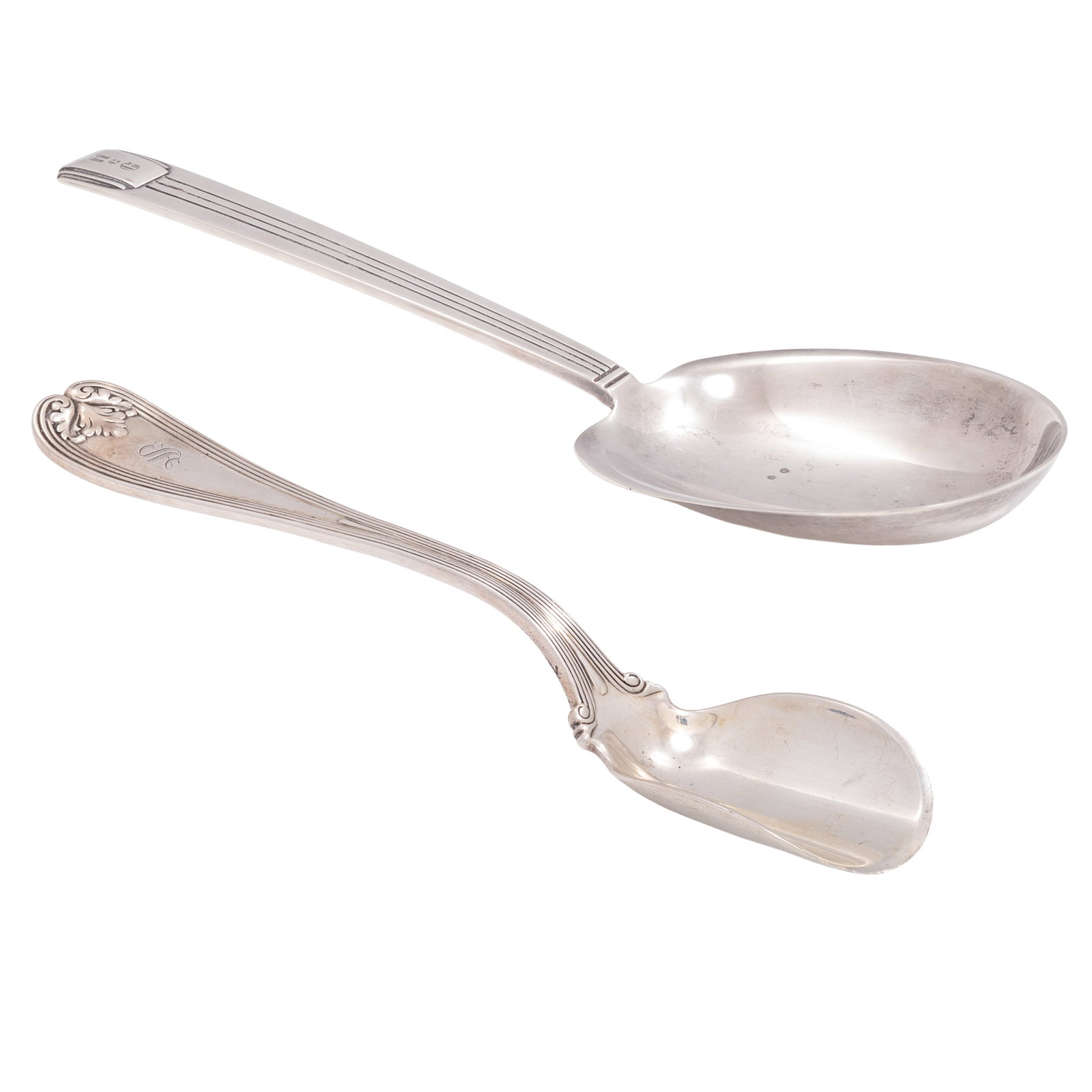 Tiffany Serve Ware: Tiffany Serve Ware One of Rococo style, 7 1/2in, the second of Neoclassical style 9 1/4in l. Both monogrammed. Both marked Tiffany & Co. 186.1 grams total.