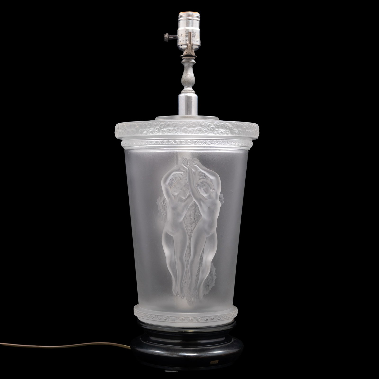 Lalique Art Deco Deux Danseuses Lamp: Lalique Art Deco Deux Danseuses Lamp 'Deux Danseuses' design of graceful swaying nymph like dancers, frosted glass with a silvery patina. Raised on an ebonized stepped metal base. Inscribed Lalique