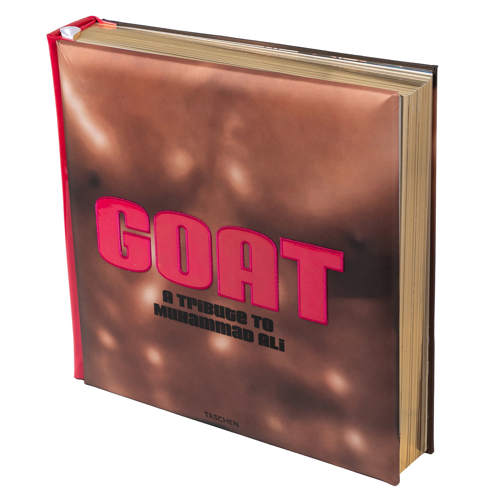 Koons, Jeff, artist (b. 1955). Taschen, [2001].: Koons, Jeff, artist (b. 1955). Taschen, [2001]. GOAT: A Tribute to Muhammad Ali. Book: hardcover, published in 2001 by Taschen, New York. Silk-covered pictorial boards with pink applique letters,