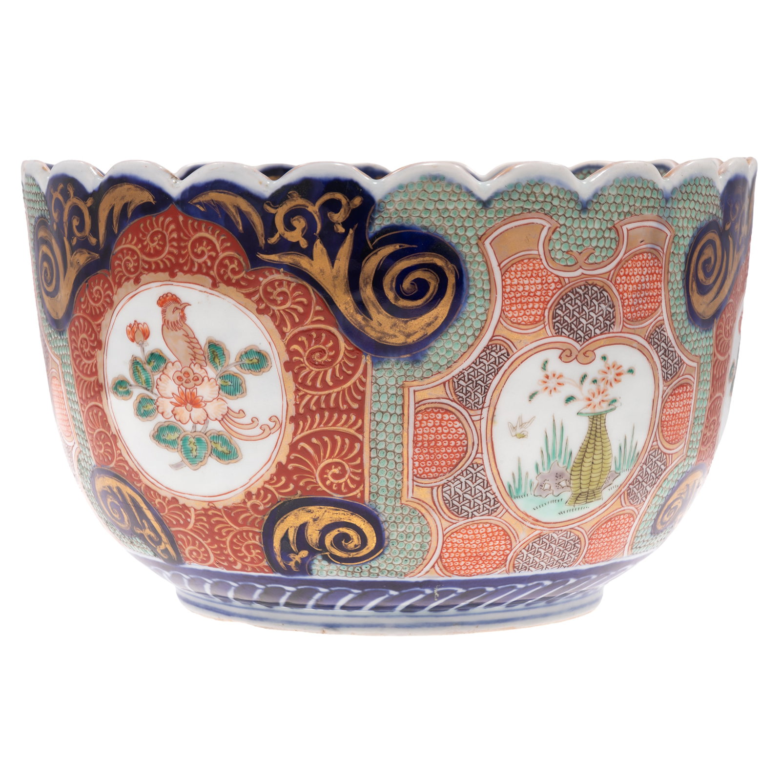 Japanese Imari Pouch Bowl, Meiji Period: Japanese Imari Pouch Bowl Meiji Period Of deep rounded form rising to ta scalloped rim, the interior and exterior richly decorated in underglaze blue , iron-red, green and gilt enamels. The center