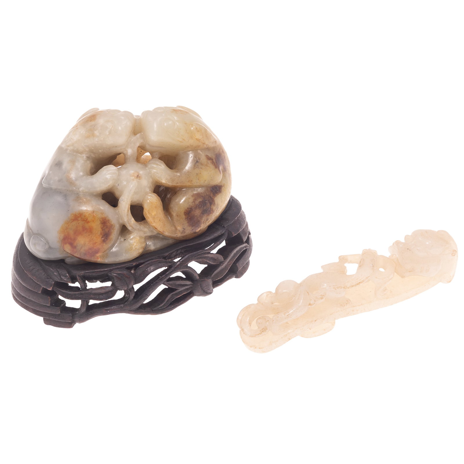 Chinese Carved Jade Belt Hood and Badger Figure with stand: Chinese Carved Jade Belt Hood and Badger Figure with stand Comprising a celadon jade carving depicting a pair of recumbent badgers or Buddhist loin dogs facing one another and holding a brocade ball