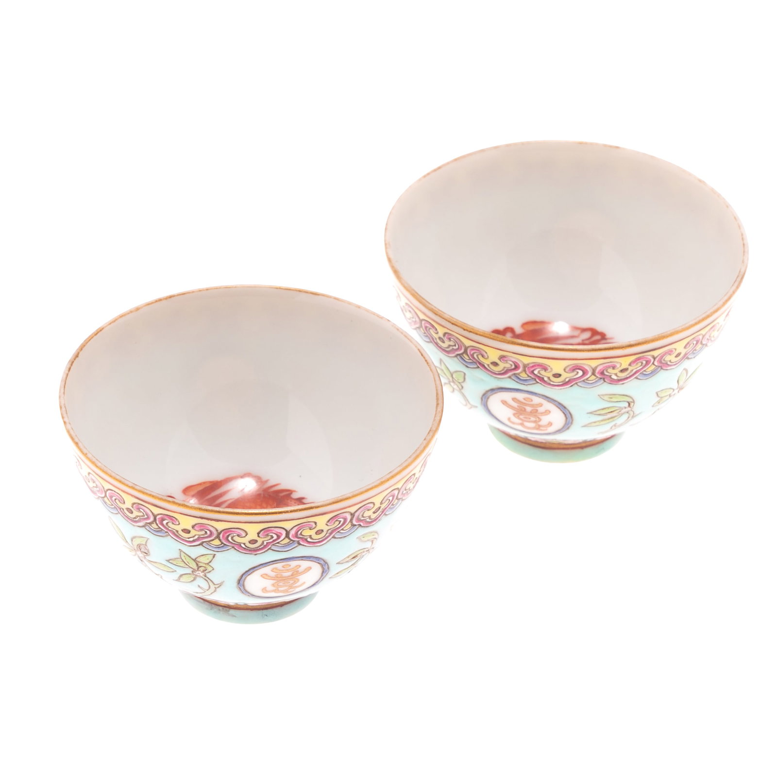 A Pair of Chinese Famille Rose Phoenix Porcelain Bowls: A Pair of Chinese Famille Rose Phoenix Porcelain Bowls Each finely potted decorated to interior with an iron-red phoenix medallion and a gilt rim, the exterior painted on a turquoise ground with styli