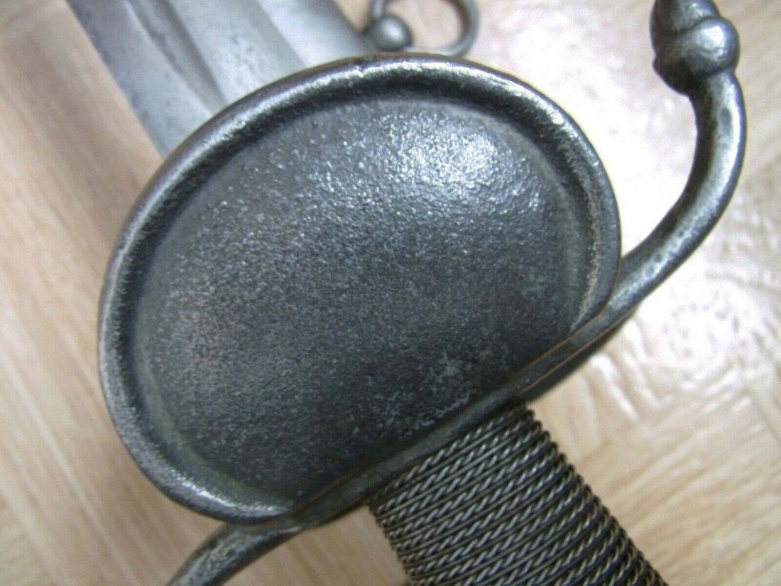 Swiss Antique Long Sword: Swiss Long Sword. 17/18 TH C. Excellent flexible Damascus blade. Silver wired grip. Length: 104 cm