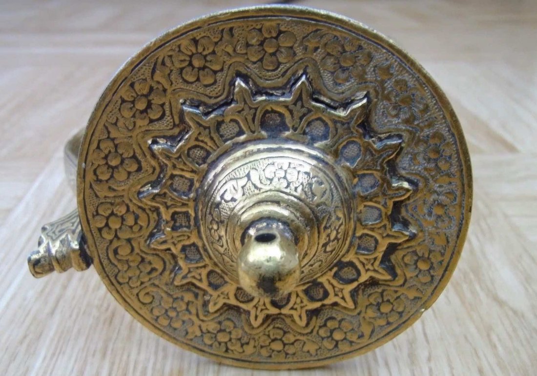 Indo Persian Tulwar Shamshir Sword: Indo Persian Shamshir Sabre. 16/17 TH C. Persian or Indian quality damascus blade. Steel hilt with heavy gold koftgari overlay. Length: 87 cm. Similar example in Leo S. Figiel Book p.54 & p 87