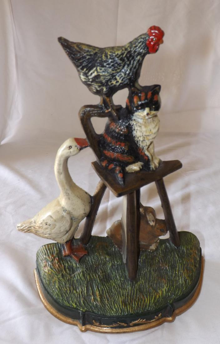 DECORATIVE METAL DOOR STOP: DECORATIVE METAL DOOR STOP - GOOSE - CHICKEN - CAT & RABBIT - APPROXIMATELY 12 INCHES IN HEIGHT AND 8 INCHES WIDE