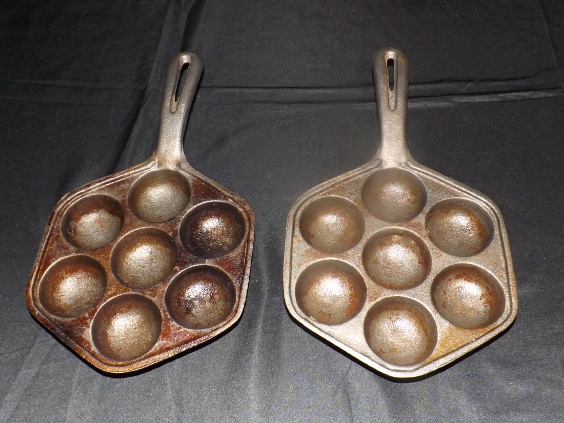 2 CAST IRON EGG POACHERS