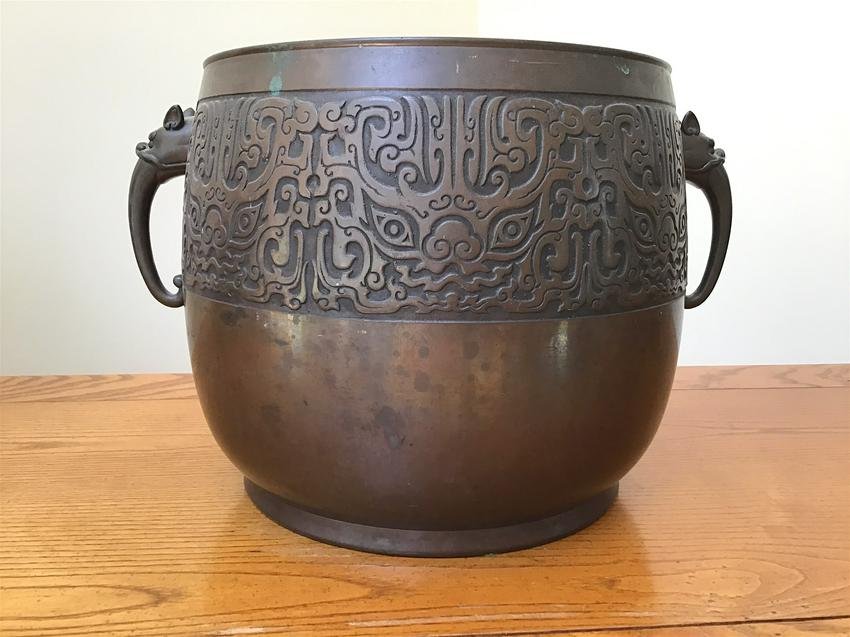 Chinese Bronze Bowl Pot with Masks ~Mid 20th Century~: Chinese Bronze Bowl Pot with Masks. Mid 20th Century. 8 1/2 inches tall. Unmarked. Very decorative. From a Cape Cod, Mass estate.