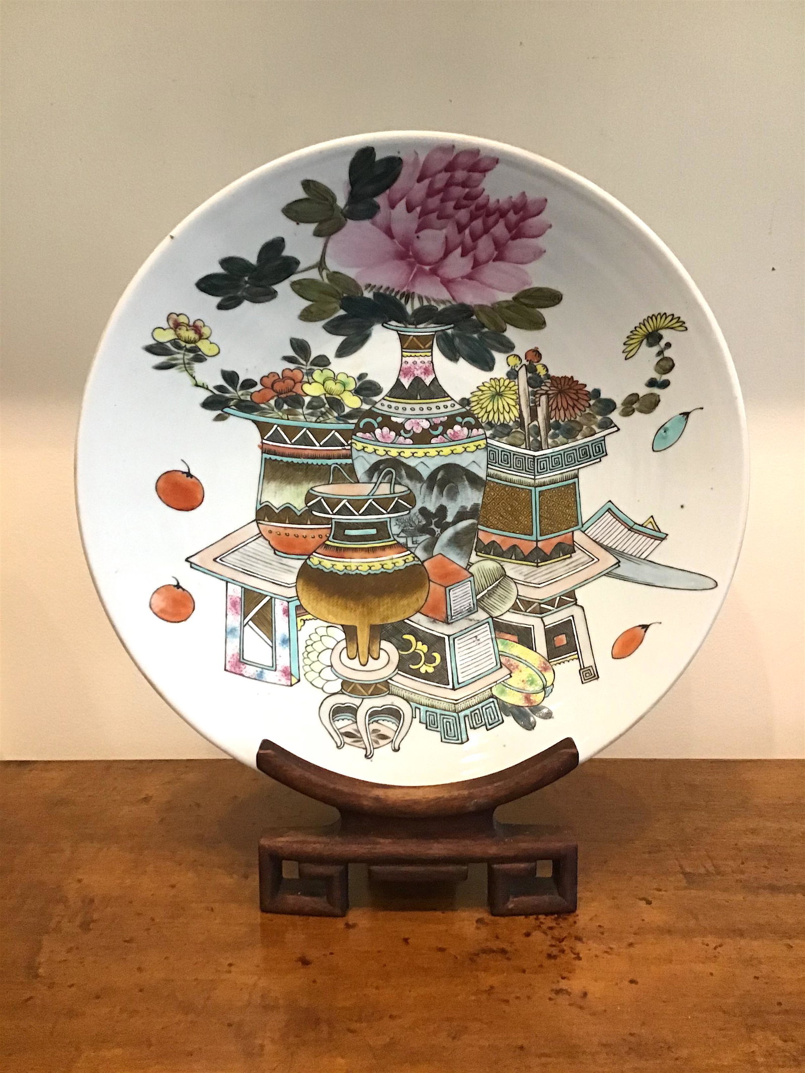 Chinese 19th C. Qing Porcelain Charger Wooden Stand: Chinese Qing 19th Cent. Charger Plate on Wooden Stand. Fine porcelain. Very good condition with no damage. Vibrant colors featuring flowers and Chinese archaic motifs. Marked on the bottom with under 