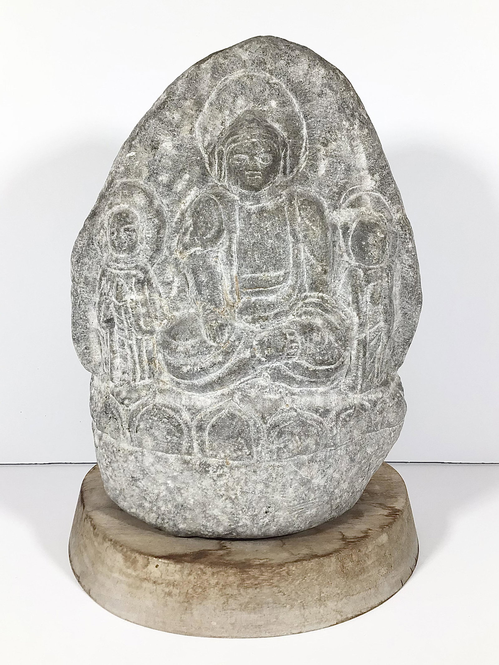 Antique Korean Buddha Rock Carving Statue: 20th Century Korean Buddha Rock Carving Statue signed on the back. Comes on wood plinth. Measures 9 inches tall not including wood plinth. From a Cape Cod, Mass estate.