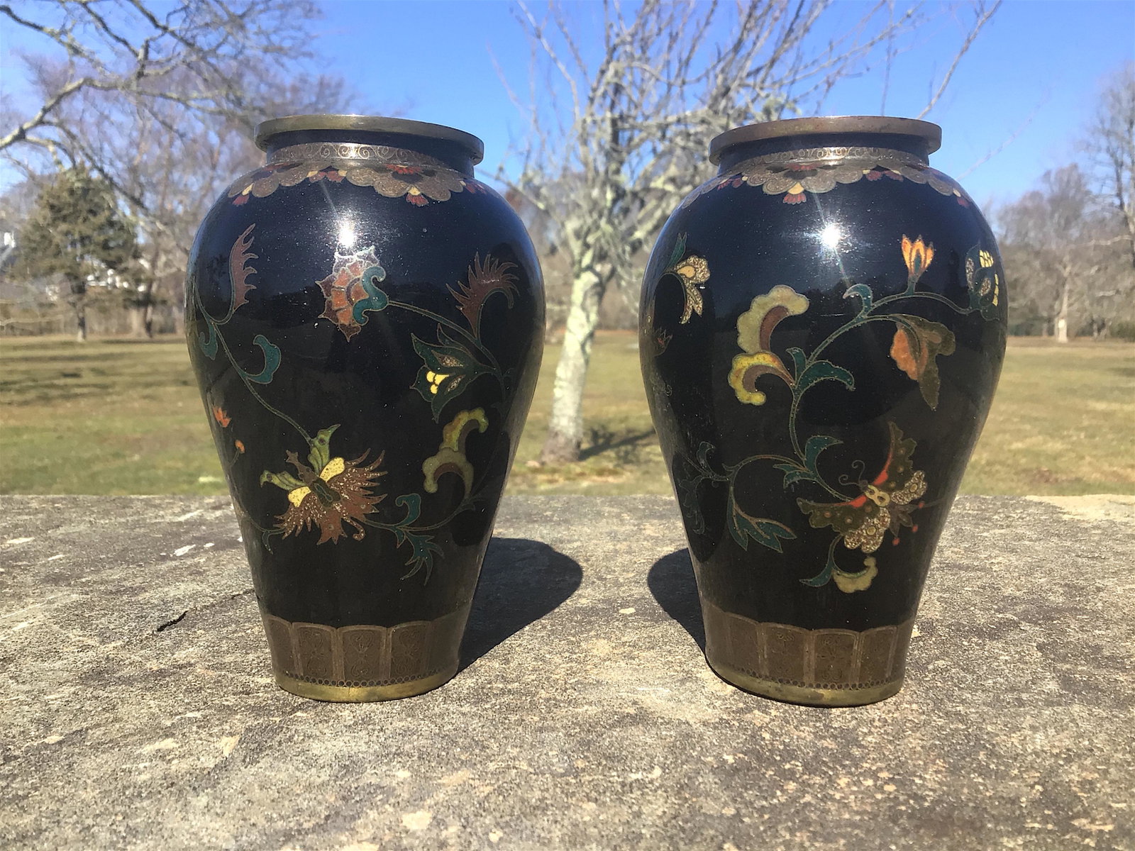 Pair of 19th Cent. Chinese Noir Cloisonne Vases: Pair of 19th Cent. Chinese Black Noir Cloisonne Vases. No damage with exquisite details of multi colored flowers and butterflies. Blue crackled interior to the vases. Unsigned. From a Newport, R.I. Es