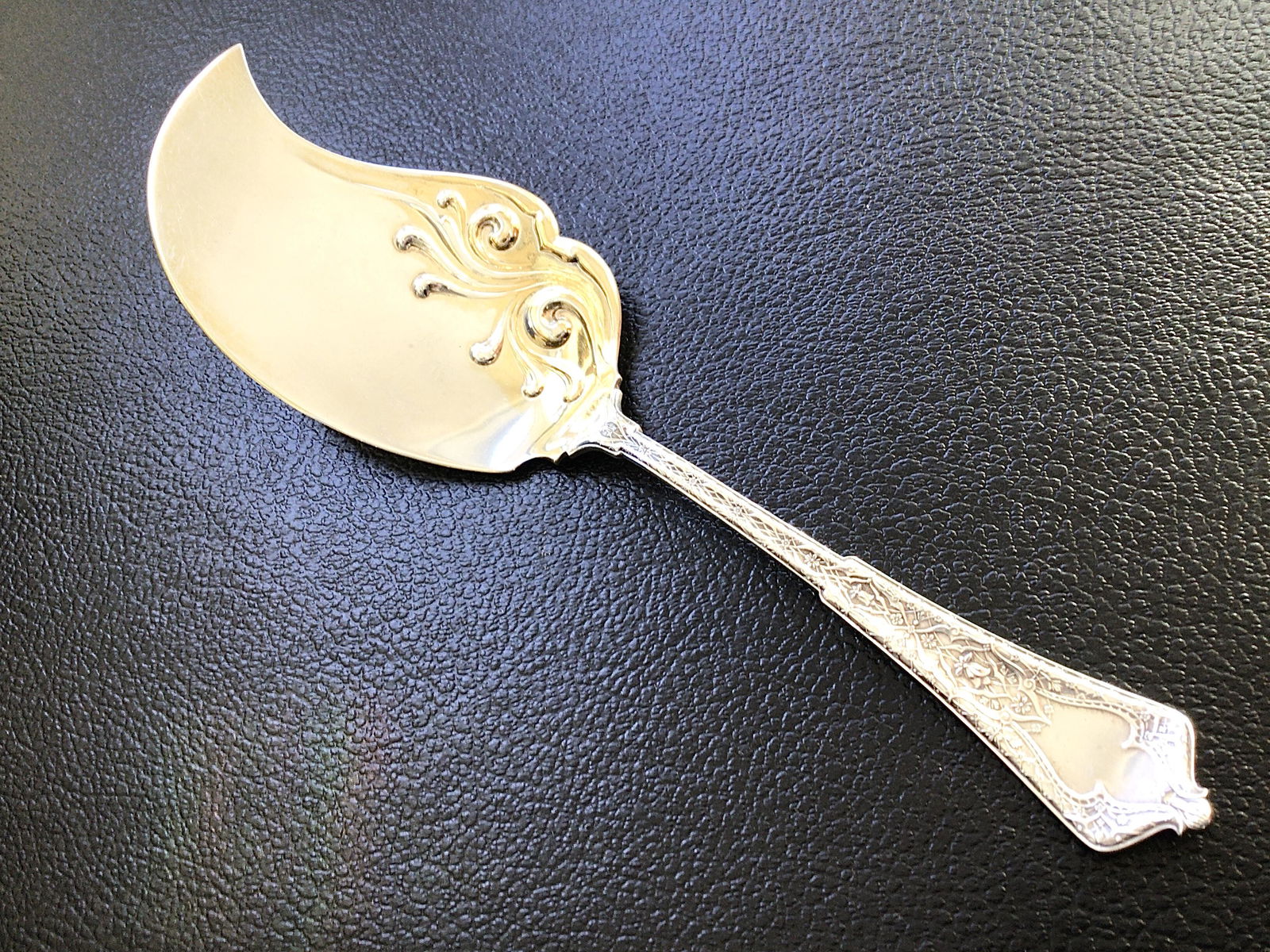Tiffany Co. Sterling Ice Cream Slicer Server ~Persian~: Tiffany Co. Sterling Ice Cream Slicer Server in the Persian pattern first introduced in 1872. Measures 11 7/8" long and weighs in at 152 grams. Marked Tiffany & Co Sterling. No monograms. It had a gol