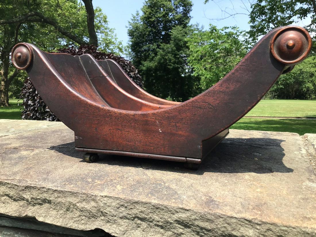 Antique Georgian Double Cheese Wheel on Casters: Antique English Georgian Period early 1800s Double Cheese Wheel on brass casters. The wood is Mahogany. This was put on tabletops and rolled across the table for serving purposes. Good condition with