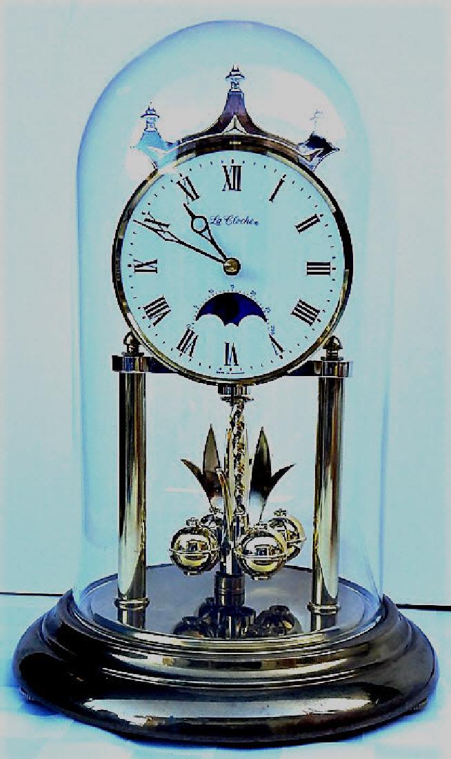 Anniversary Clock "La Cloche" with Glass Dome: Made in Germany. Measures 14".