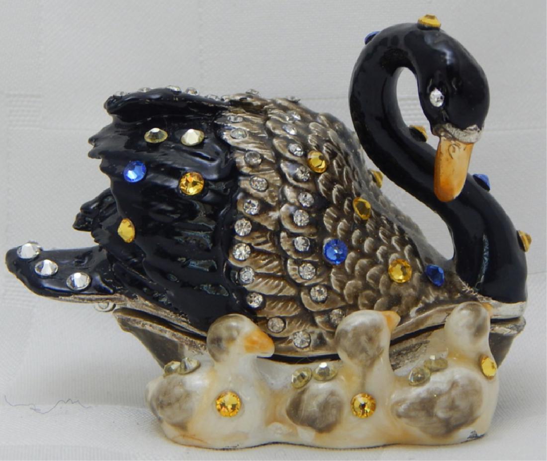 Jeweled Enamel Swan Trinket Box: Decorated with crystals, white interior and magnetic closure. Measures 2 1/2" x 3".