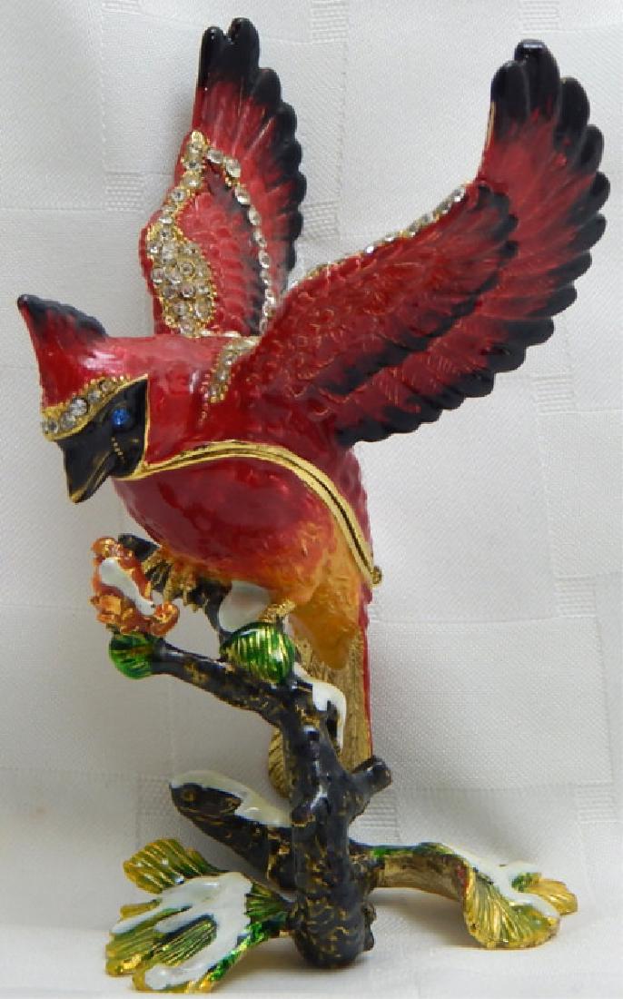 Jeweled Enamel Bird on Branch Trinket Box: Decorated with crystals, orange interior and magnetic closure. Measures 4 1/2".