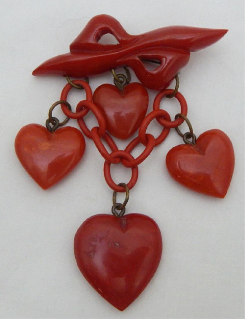 Vintage Ruby Red Bakelite Bow With Hearts Brooch (1 of 2)