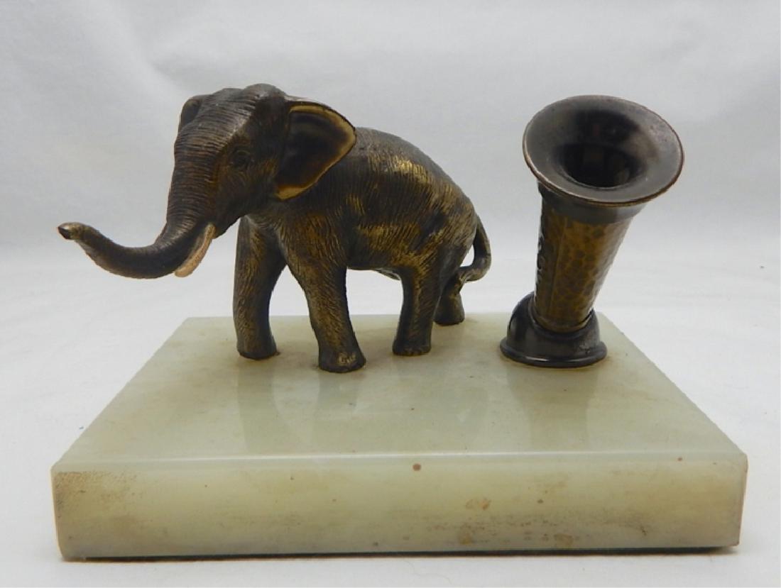 Gilt Bronze Elephant Pen Holder on Onyx Base: Circa 1880s. Measures 3 1/2" x 5 1/2" x 4 1/2". Estimate $200 - $300 Starting Bid $30