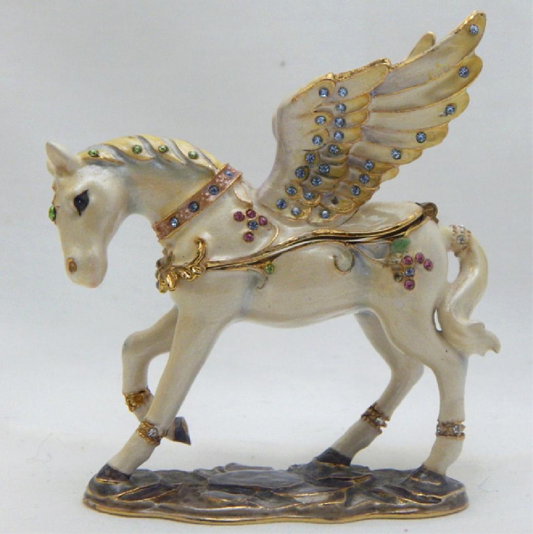 Jeweled Enamel Winged Horse Trinket Box: Multi colored jewels with hinged lid, magnetic closure and enamel interior. Measures 3 1/2" x 3". Estimate $30 - $50 Starting Bid $10