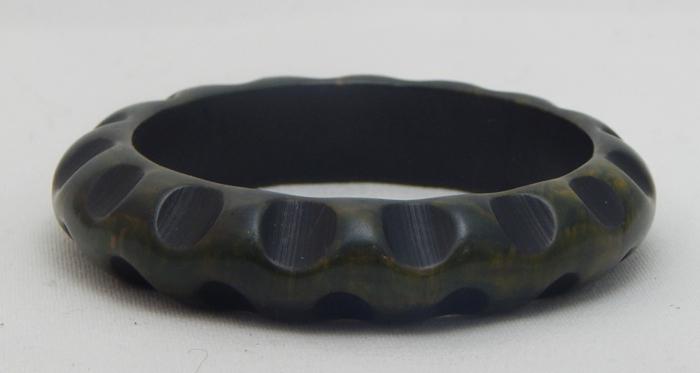 Vintage Carved Black Bakelite Bangle: Estimate $200 - $300 Starting Bid $20