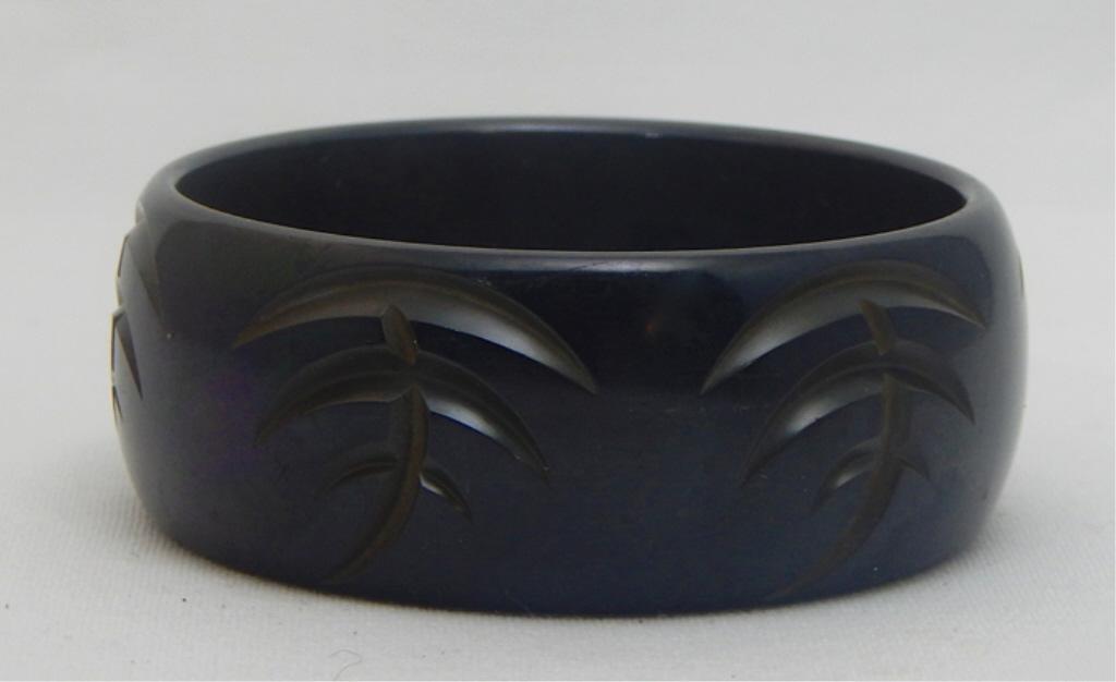 Vintage Carved Black Bakelite Bangle: Estimate $200 - $300 Starting Bid $20