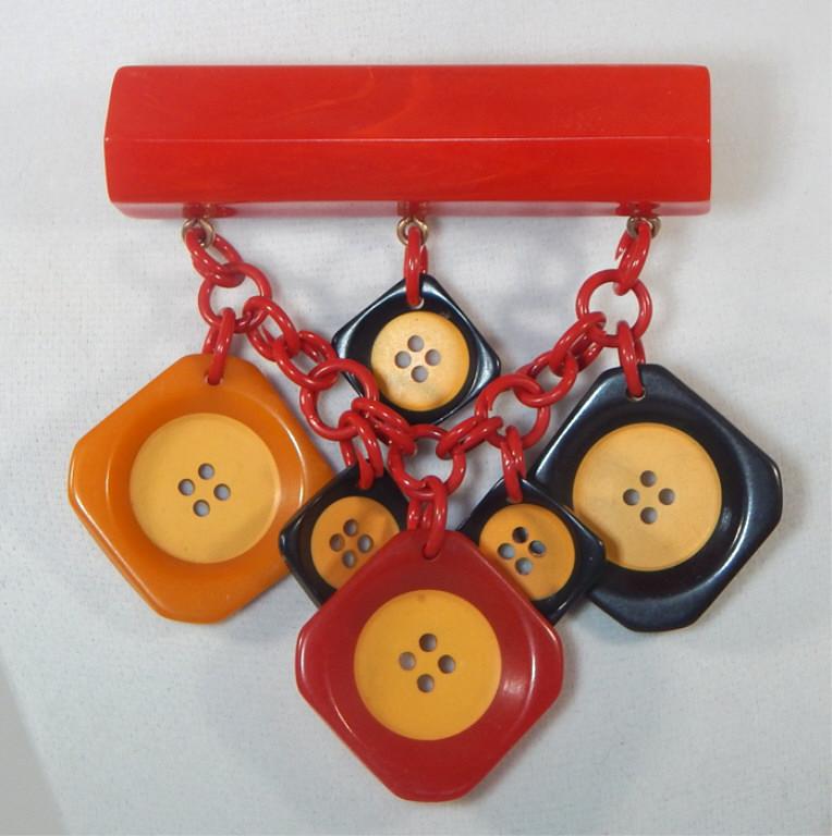 Vintage Bakelite Button Brooch: Measures 3 3/4" x 3". Estimate $200 - $300 Starting Bid $20