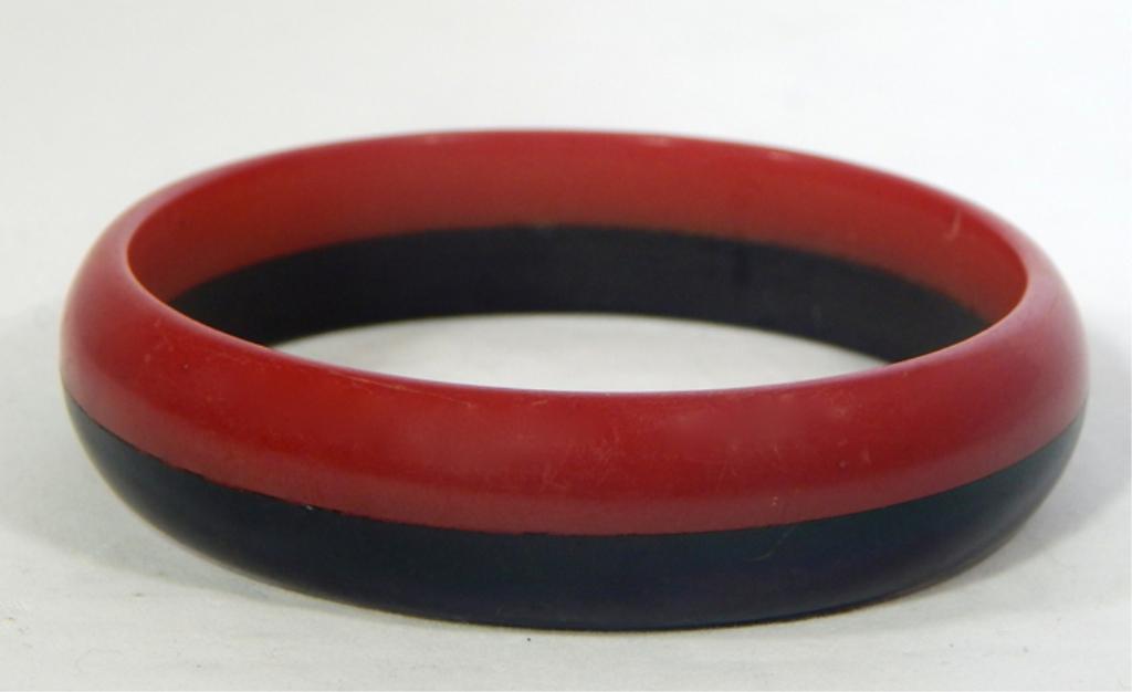 Vintage Rare Red and Black Stripe Bakelite Bangle: Estimate $200 - $300 Starting Bid $20