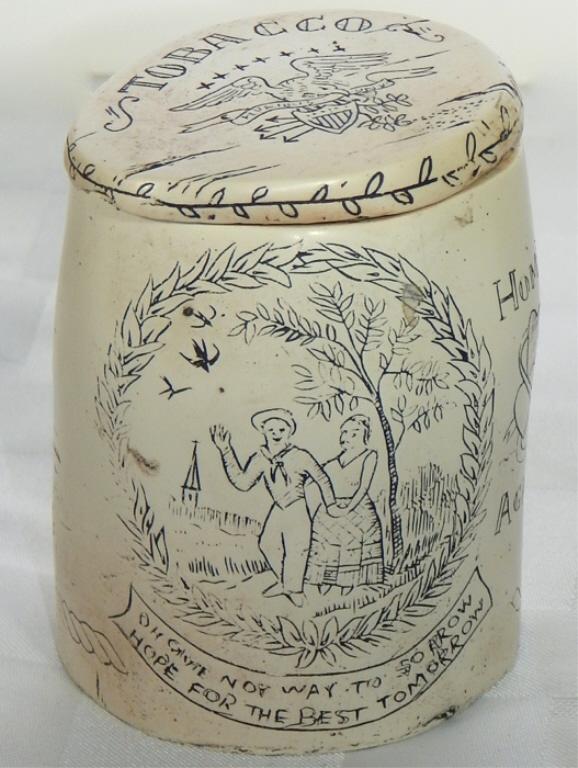 Scrimshaw Tobacco Jar: Depicting various figural scenes, buildings, ships, etc. Measures 4" x 2 1/2". Estimate $40 - $80 Starting Bid $10
