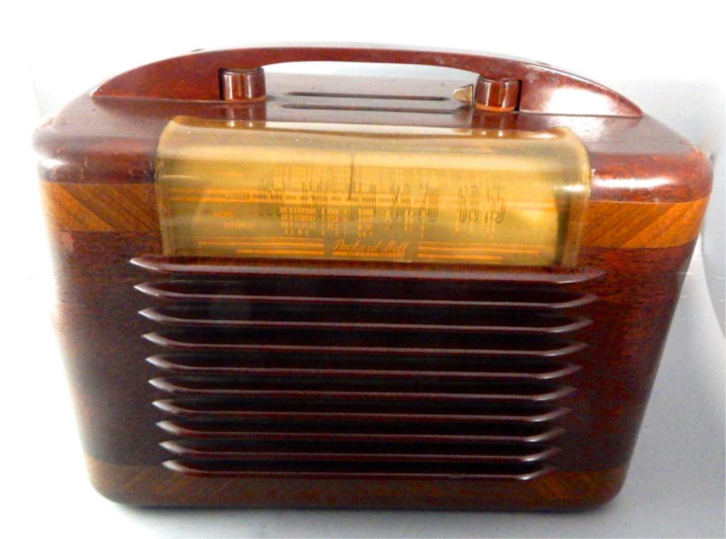 Original Inlaid Wood Packard-Bell Hi Q Radio: Good condition. Measures 9 1/2" x 12" x 6 1/2". Estimate $50 - $100 Starting Bid $10