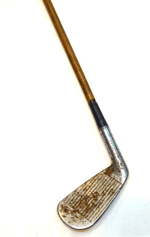"Spalding Tournament Model" 5-Iron Golf Club: Wooden shaft and leather handle. Estimate $100 - $150 Starting Bid $20