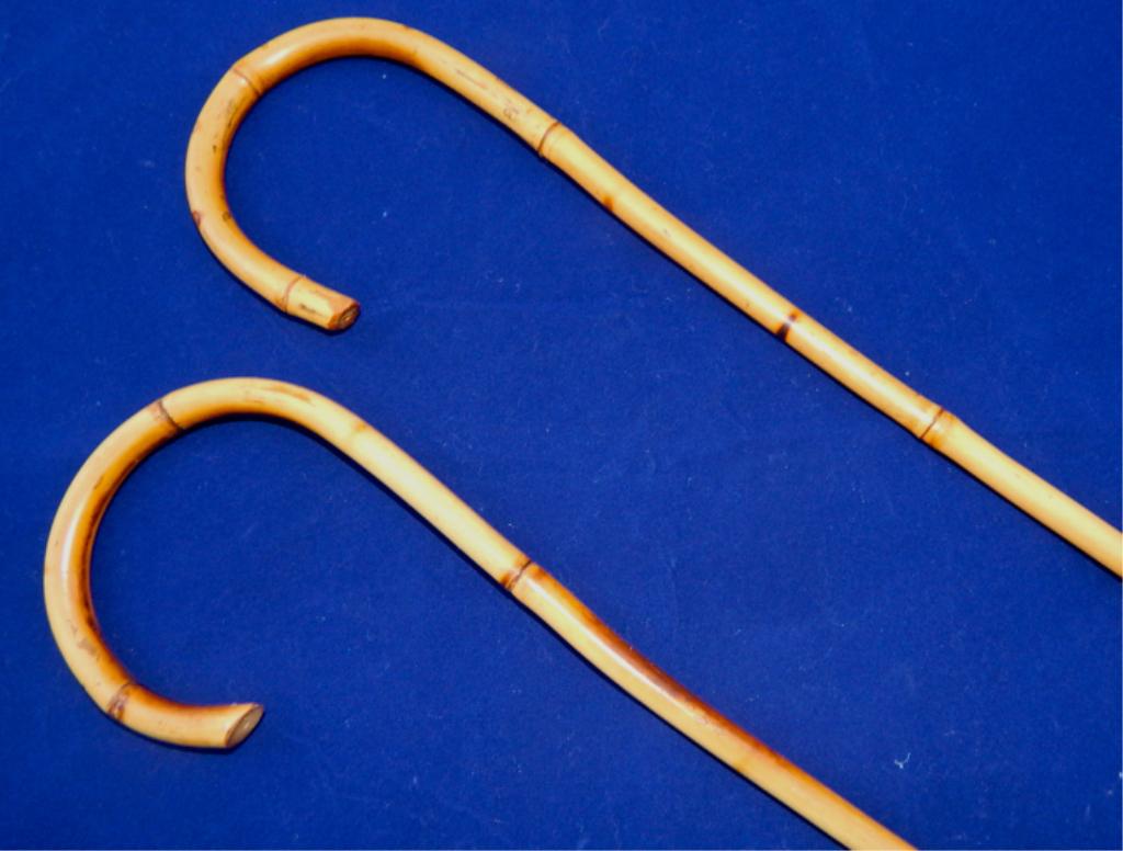 2 Thin Design Bamboo Charlie Chaplin Style Canes: Measures 35" and 36". Estimate $40 - $60 Starting Bid $20