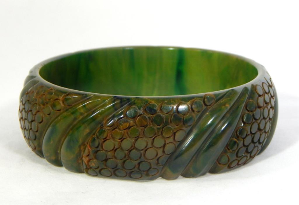 Vintage Carved Green Bakelite Bangle: Estimate $200 - $300 Starting Bid $20