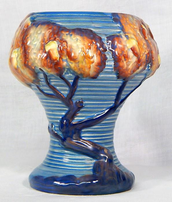 Carlton Ware "Night Oak" Pottery Vase: Blue Night Oak Tree pattern vase. Made in England, c1930s. Makers mark and incised number. Measures 6 1/2" x 5". Estimate $100 - $150 Starting Bid $20