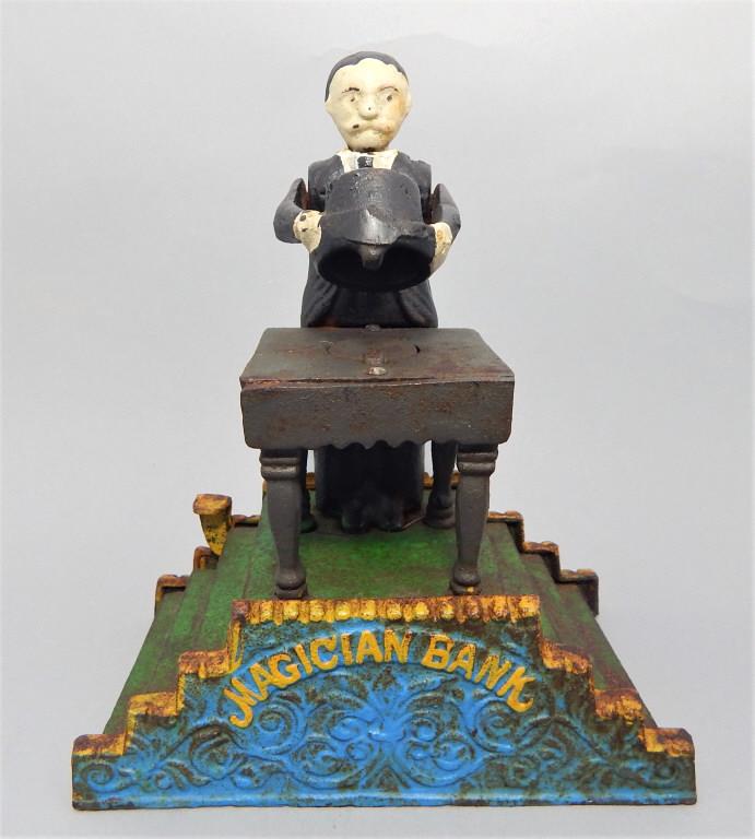 Cast Iron Mechanical Bank, c1950s: Marked on the bottom "Taiwan", in good condition and measures 8" x 7" x 4". Estimate $50 - $100 Starting Bid $20
