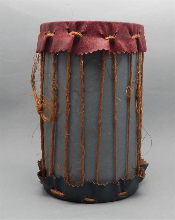 Native American Handmade Wood Drum: Painted wood and leather drum. Measures 7" x 5". Estimate $30 - $50 Starting Bid $10