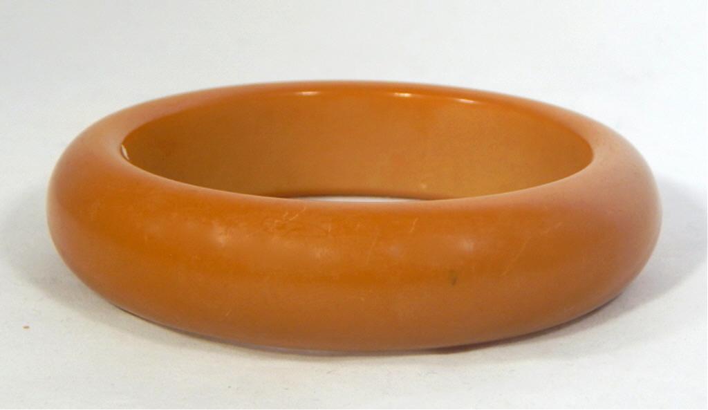 Vintage Ruza USA Butterscotch Bakelite Bangle: Original label. Estimate $200 - $300 Starting Bid $20