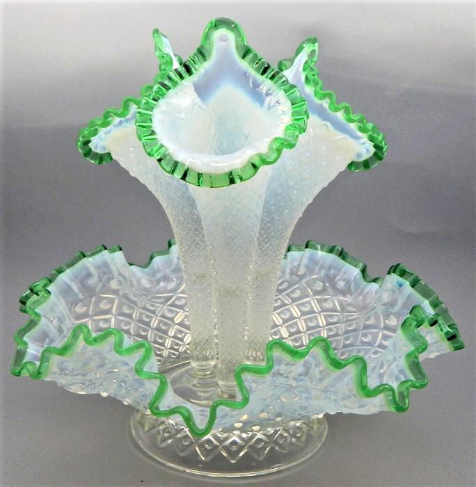 Victorian Glass Epergne with Green Trim: Wonderful design in white glass epergne with three horn vases at center of ruffled rim bowl. Great condition. Measures 12" x 12". Estimate $200 - $400 Starting Bid $50